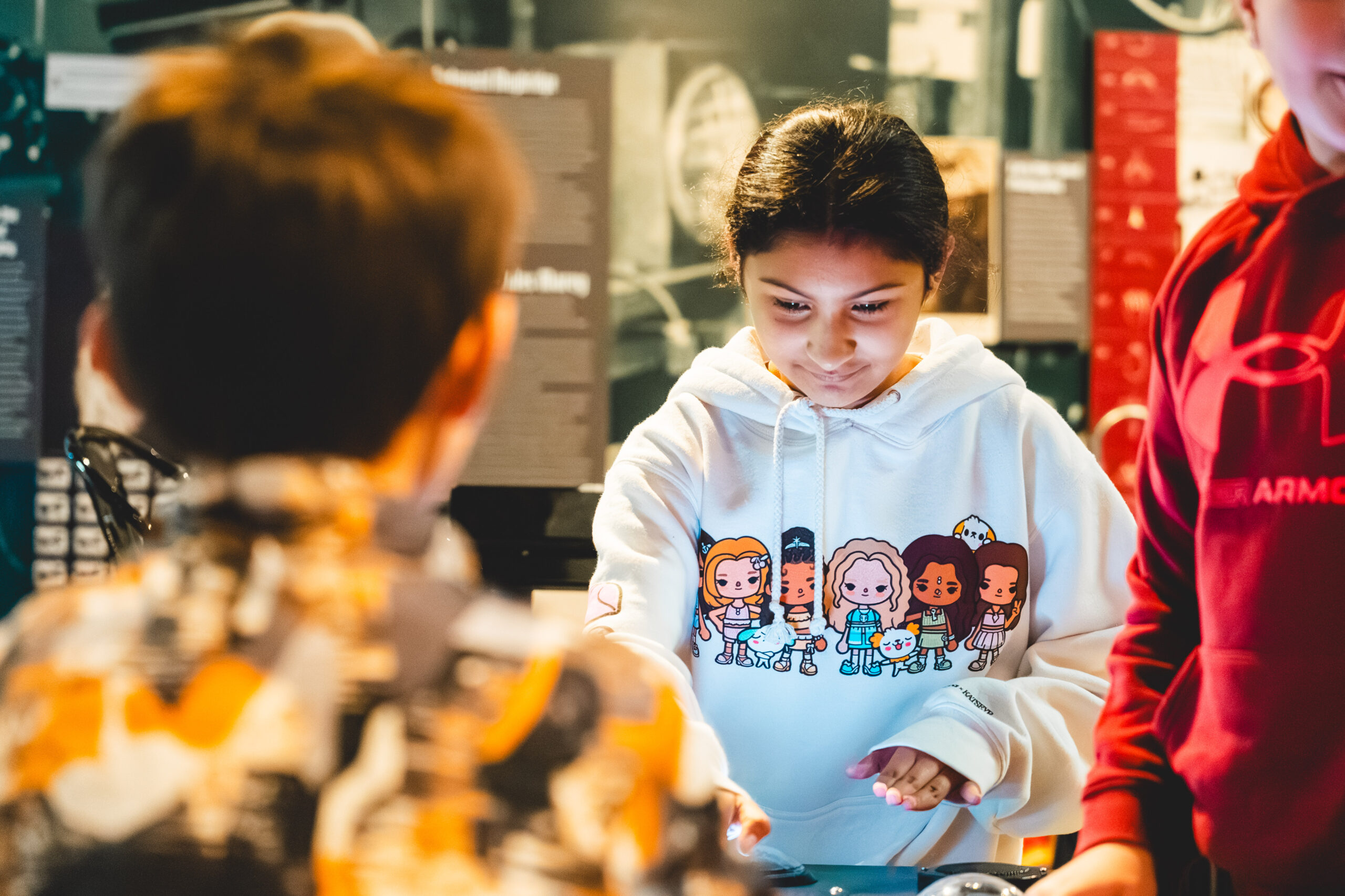 kids playing inside the edgerton center