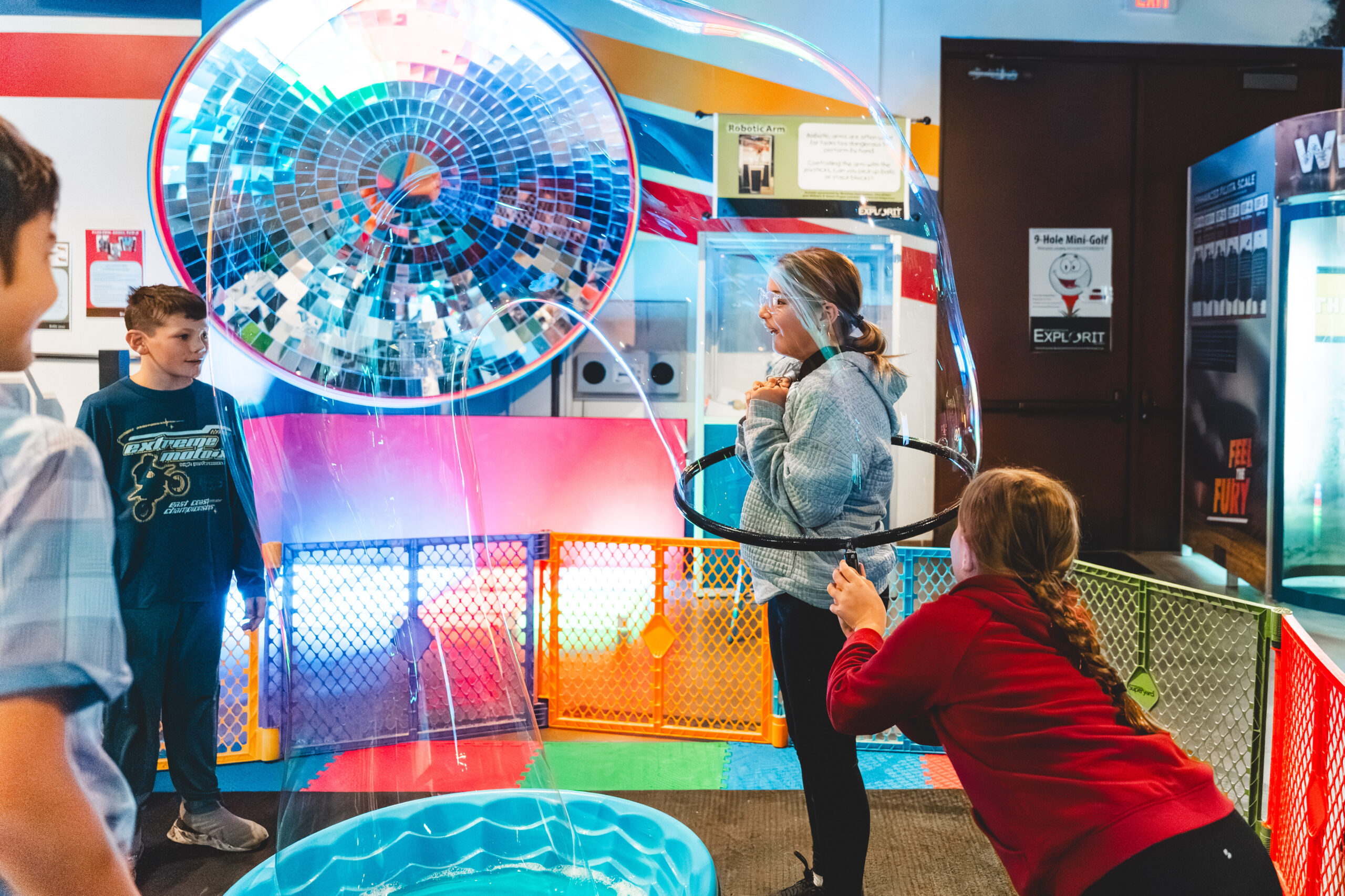 kids playing inside the edgerton center