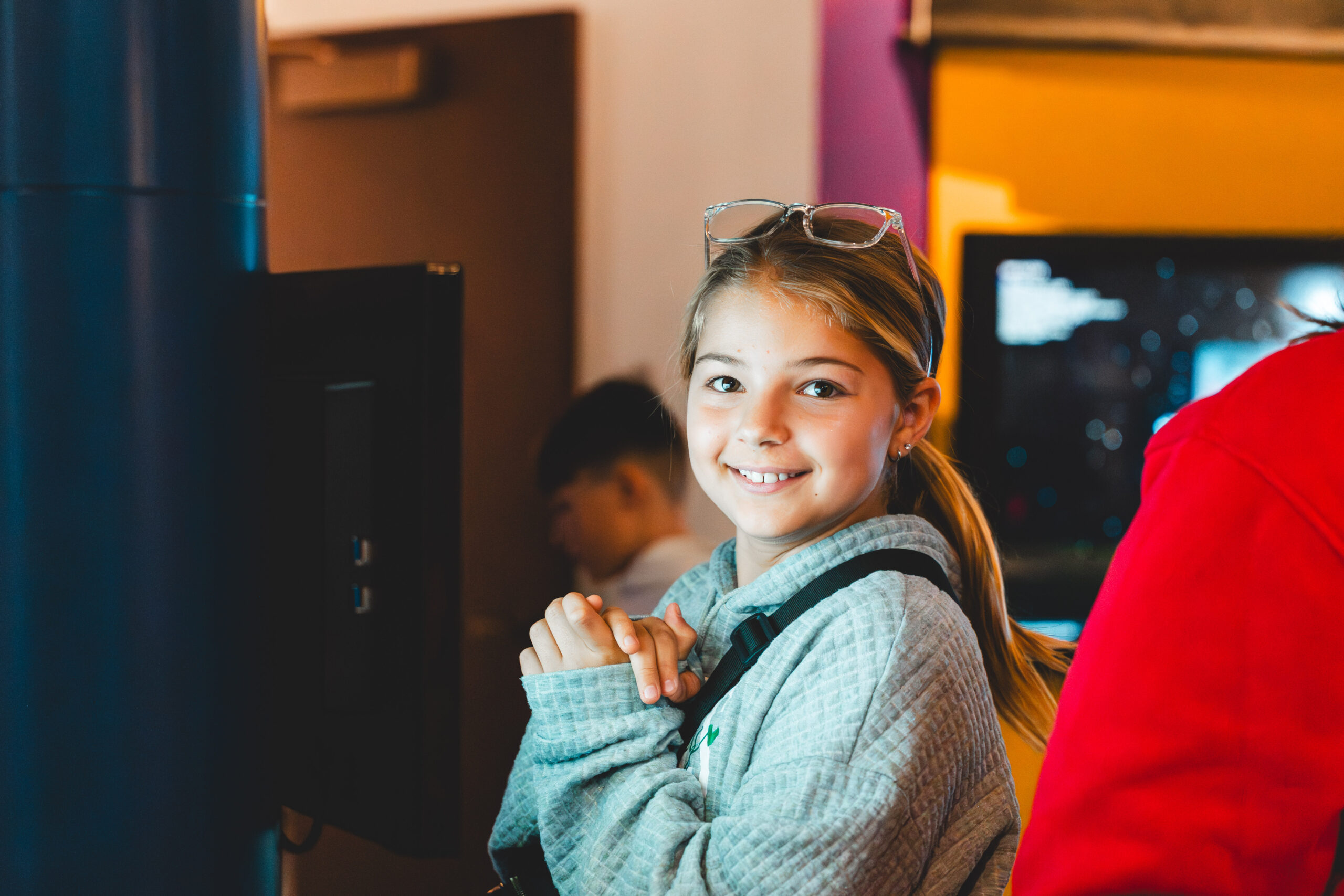 little girl smiling inside edgerton center